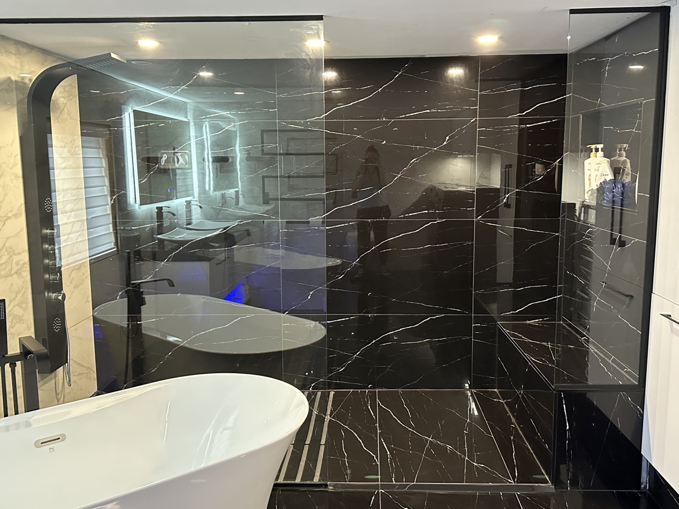Shower tub black marble after